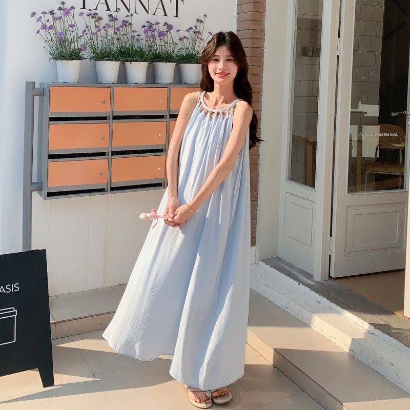 Light blue soft girl aesthetic maxi dress in natural daylight