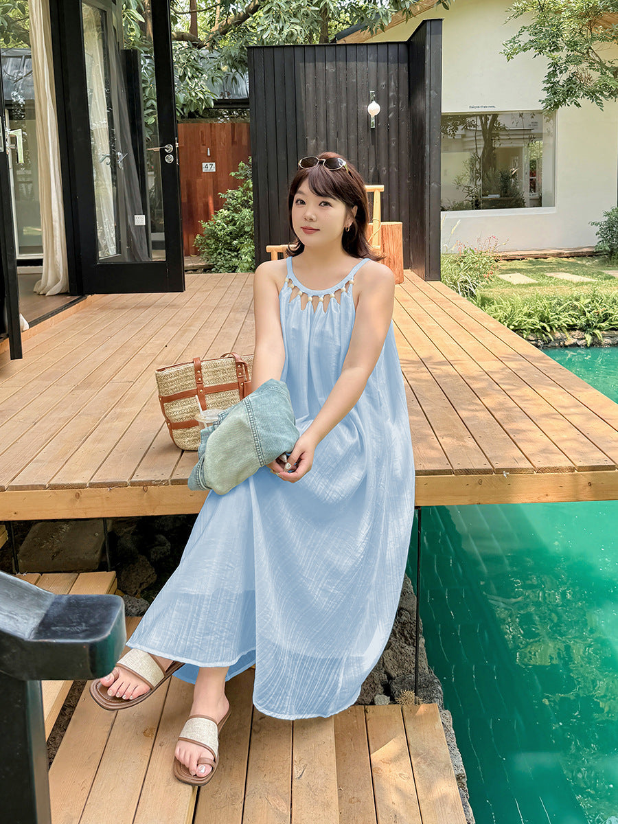 Relaxed sky blue halter neck dress for casual vacation wear by poolside